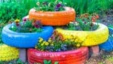 wild flowers A half tire wall planter.